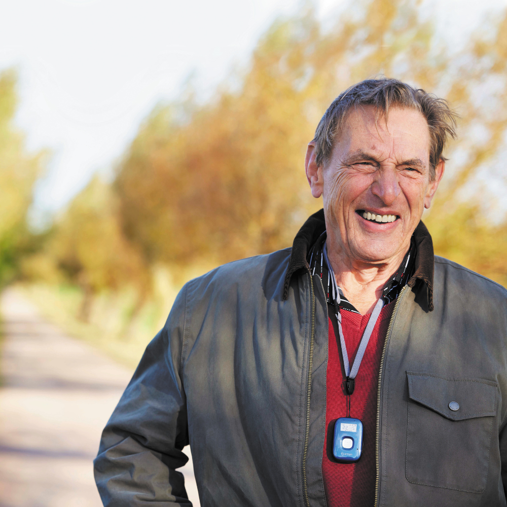 man-outdoors-wearing-mobile-social-alarm2