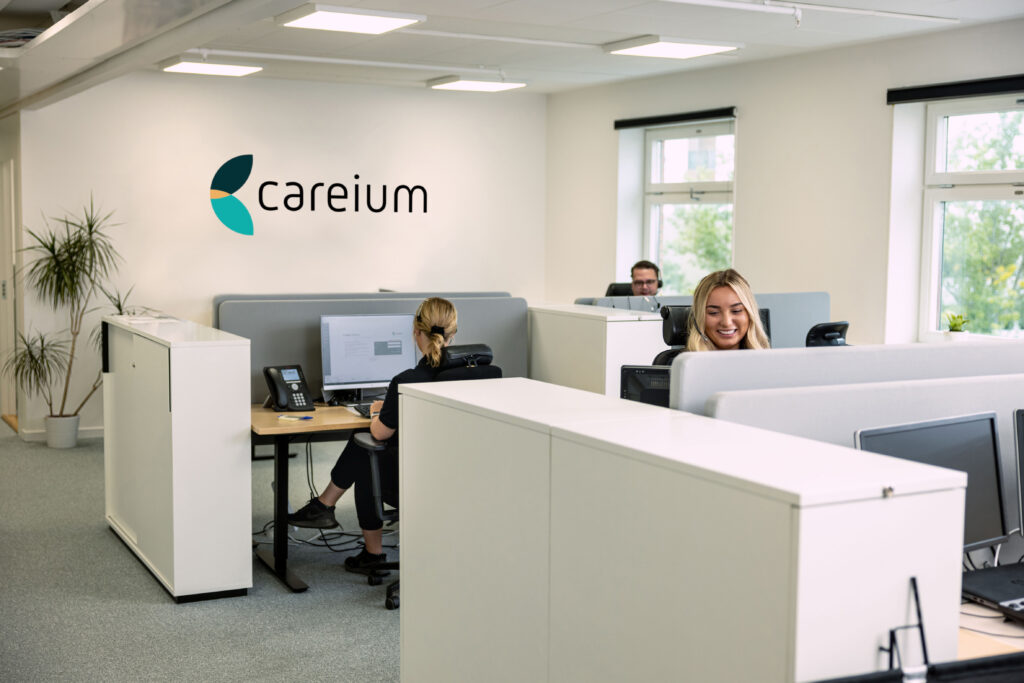 alarm operators taking calls at a Careium monitoring centre