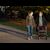 Senior woman and young woman walking and talking outdoors